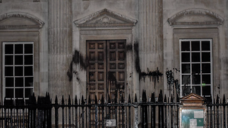 Senate House splashed with black ‘oil’ by XR activists