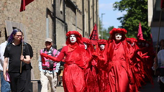 Climate protesters rally in central Cambridge