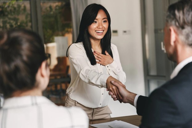 Woman greeting recruiters